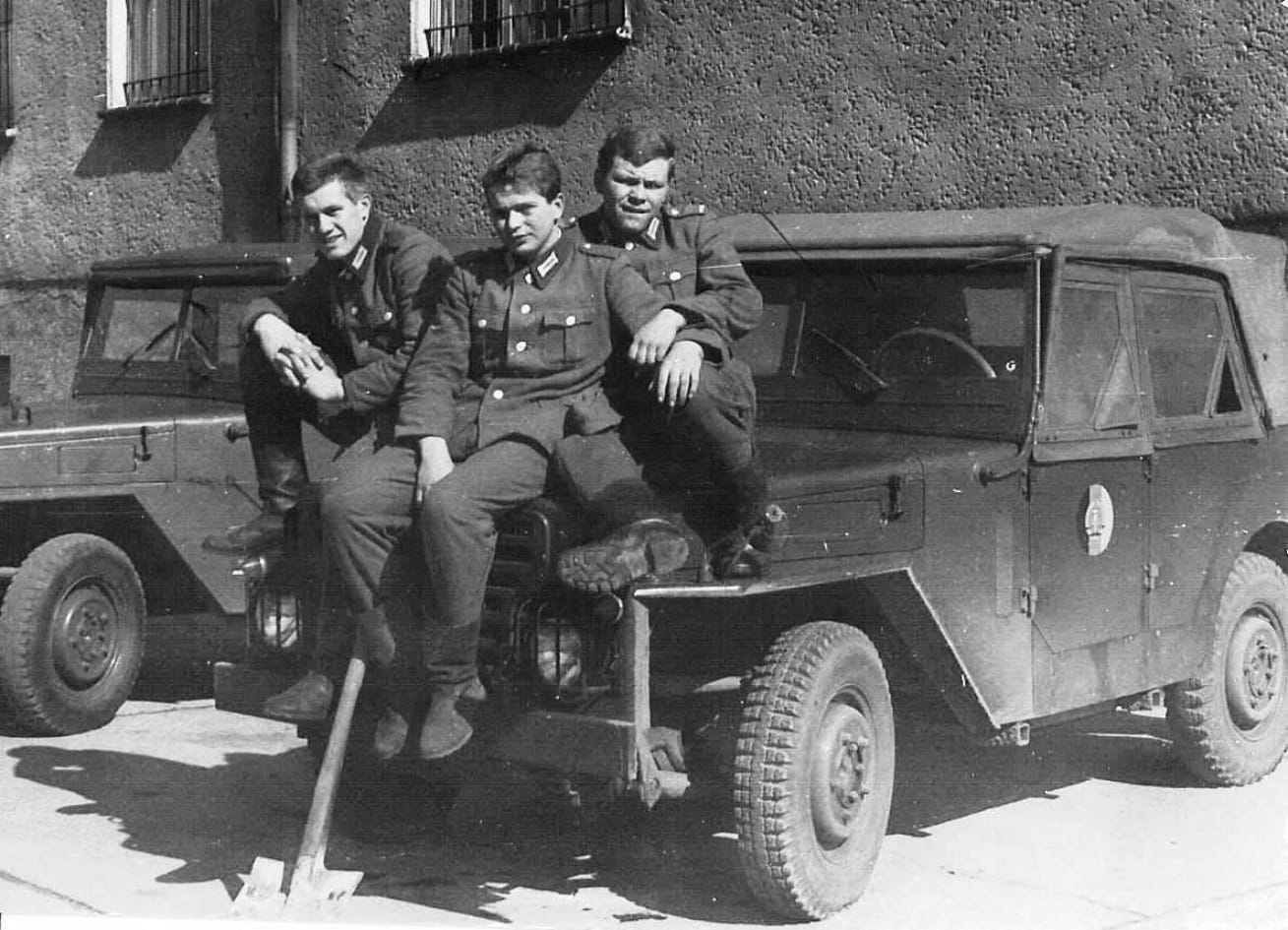 Border guards pose on the bonnet